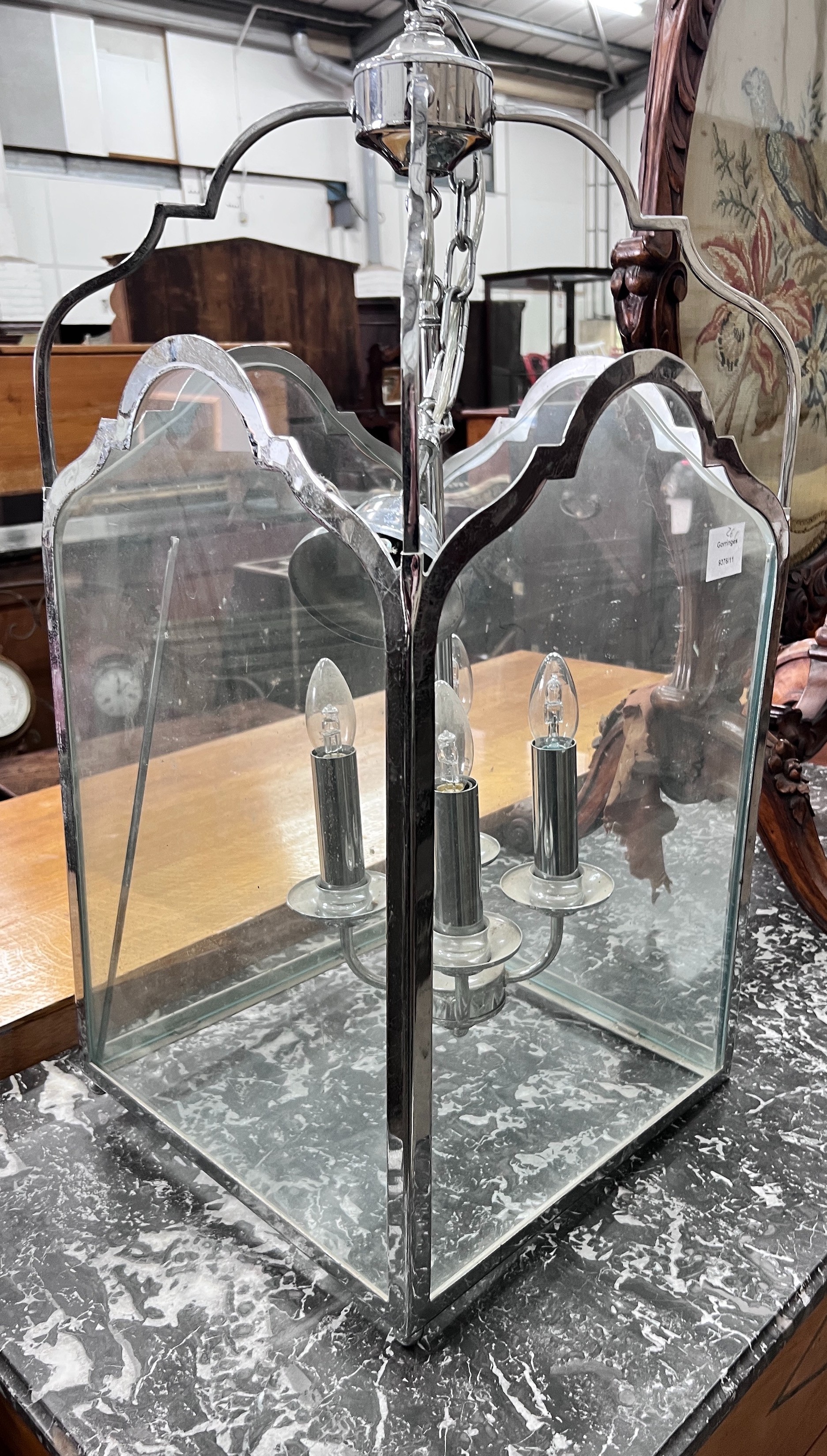 A chromed metal hall lantern, width 35cm, height 75cm *Please note the sale commences at 9am.
